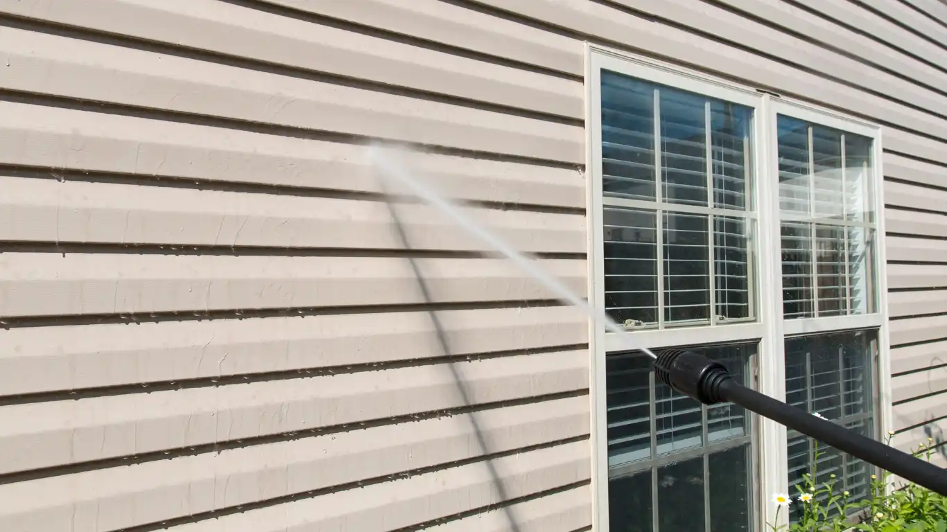 Power washing siding and brick